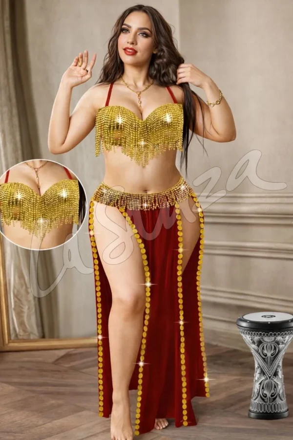 Description: Step into the spotlight with this stunning dance set, designed to turn every moment into a captivating performance. Inspired by the elegance and rhythm of belly dance fashion, this piece blends luxury, movement, and sensuality in one unforgettable look. Whether you are performing, creating content, or simply embracing your bold feminine energy, this dance set is crafted to highlight your confidence and body in the most flattering way. The top features a dazzling gold fringe design that moves beautifully with every step, adding sparkle and fluid motion. The shimmering details catch the light effortlessly, making it perfect for stage performances or intimate settings where every movement matters. The structured bust ensures support while maintaining a seductive silhouette, giving you both comfort and style. The skirt is where the magic truly happens. Designed with a high-slit cut and decorated with vertical coin chains, it creates an eye-catching flow that enhances your natural curves. Each step becomes a statement, as the coins sway rhythmically, adding both visual and auditory allure. This dance set is not just an outfit—it’s an experience that elevates your presence. Perfect for women who love hot lingerie and bold statement pieces, this outfit crosses the line between performance wear and seductive fashion. It’s ideal for those searching to buy lingerie online in Egypt that stands out from typical designs. The blend of elegance and daring detail makes it suitable for special nights, performances, or even creative photoshoots. Crafted with comfort in mind, the fabric feels soft on the skin while maintaining durability. The adjustable straps and flexible fit ensure that it suits different body shapes beautifully. If you're looking for sexy lingerie that combines culture, luxury, and movement, this is the perfect choice. At LaSanza, we understand that modern women want more than just style—they want expression. This dance set captures that spirit, offering a unique alternative to everyday lingerie sexy styles. It’s also a great addition if you’re exploring versatile fashion beyond a typical pajama in Egypt, giving you something bold and unforgettable. Whether you choose the classic black or the passionate red version, each color tells its own story. Black brings mystery and elegance, while red radiates confidence and intensity. No matter your choice, this dance set guarantees a powerful impression. Material: Premium polyester blend with metallic embellishments Delivery: Delivery within 2–3 days across Egypt Why LaSanza Lingerie? At LaSanza, we redefine confidence through fashion. Our collections are designed for women who embrace their bold side while valuing quality and comfort. We carefully select every piece to ensure it meets high standards of style, durability, and fit. With fast delivery across Egypt and a commitment to premium designs, LaSanza is your trusted destination when you want to buy lingerie online in Egypt.